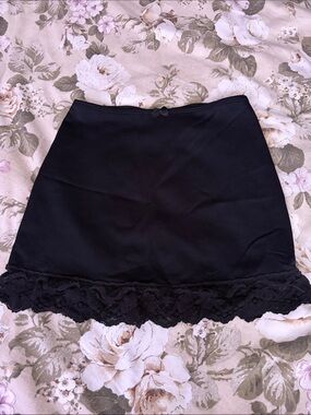 Nancy Ganz Black Mini Skirt with Lace Hem